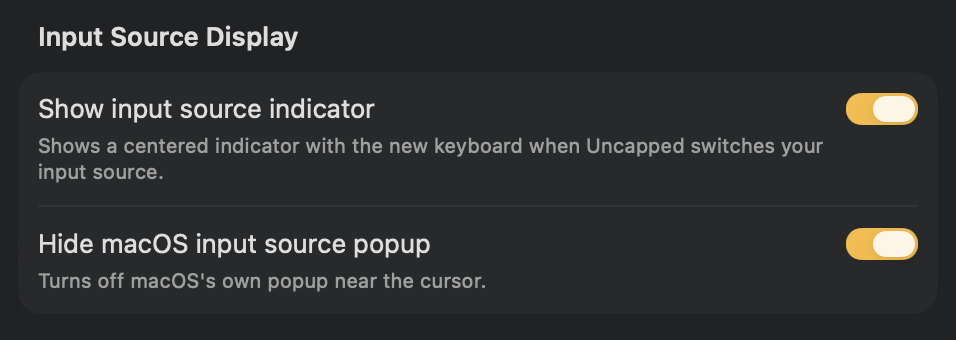 Uncapped's centered input-source indicator The centered indicator shown when the input source changes